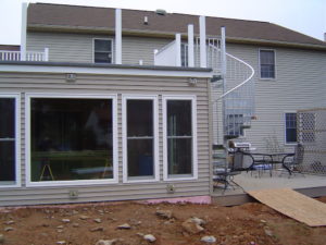 Addition with deck and hot tub